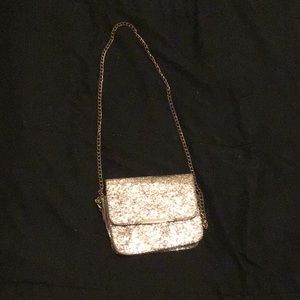 A glittery purse That has not been used